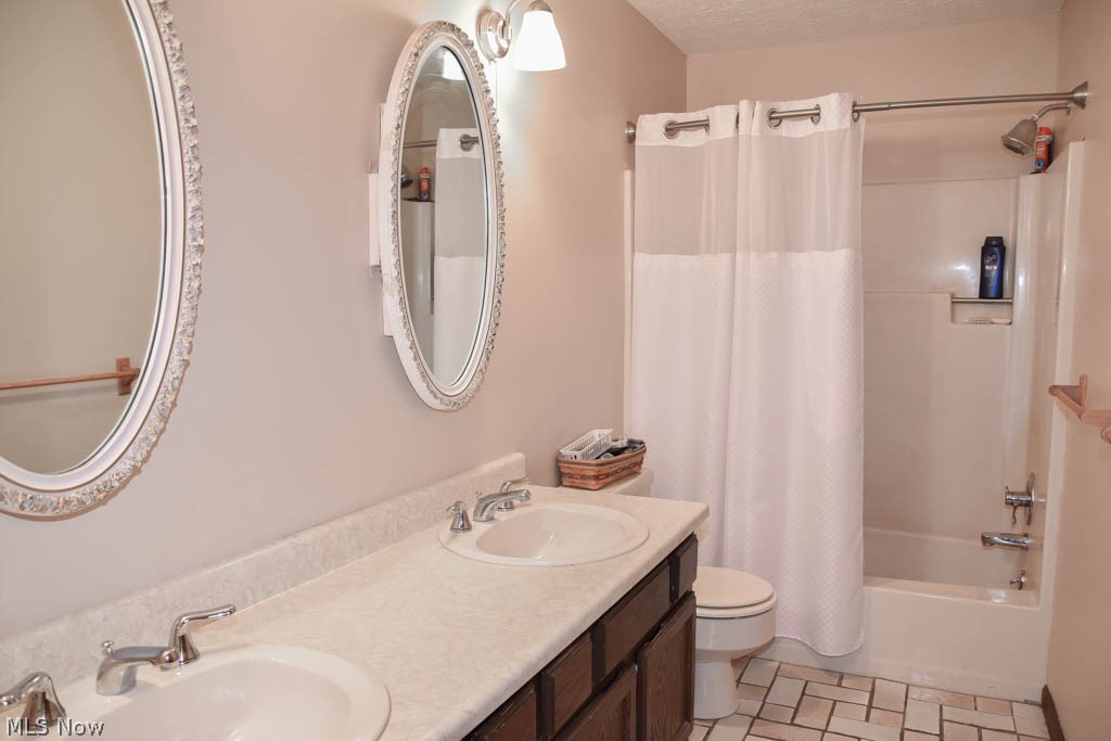 6955 Taylor Road Clinton, OH 44216 - Photo 19 of 26 Main full bath with dual sinks.
