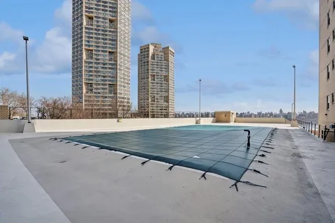 a view of a city with tall buildings