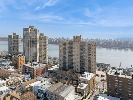 a view of a city with tall buildings in the background