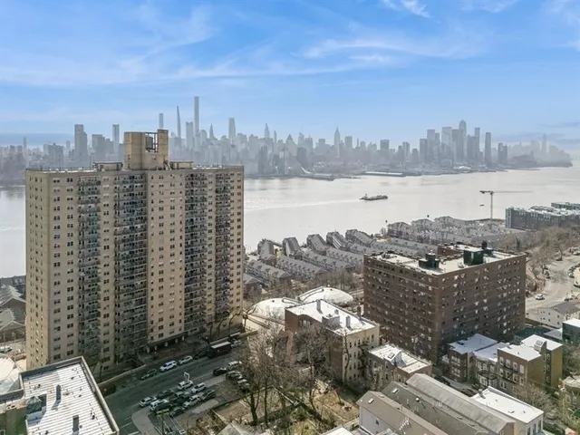 a view of a city with tall buildings