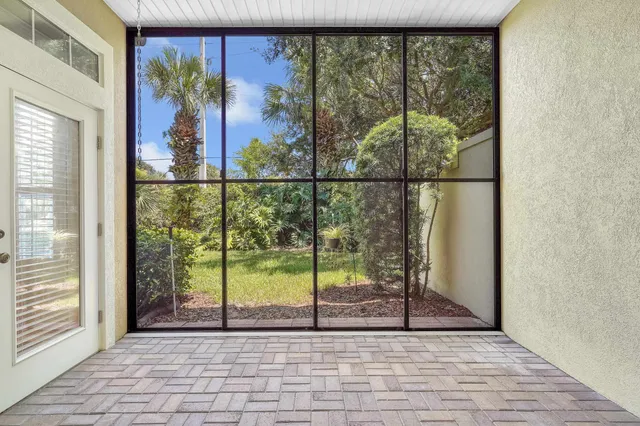 a view of a room with a large window