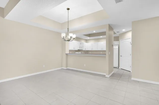 a view of a kitchen with an empty space