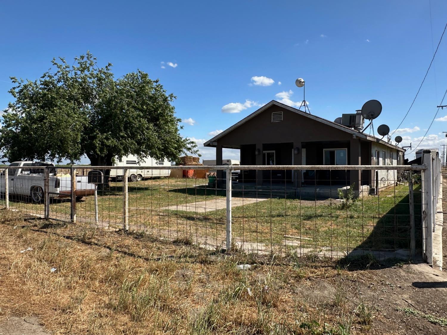 7599 Ave 152 Tipton, CA 93272 - Photo 17 of 17 a front view of a house with a yard