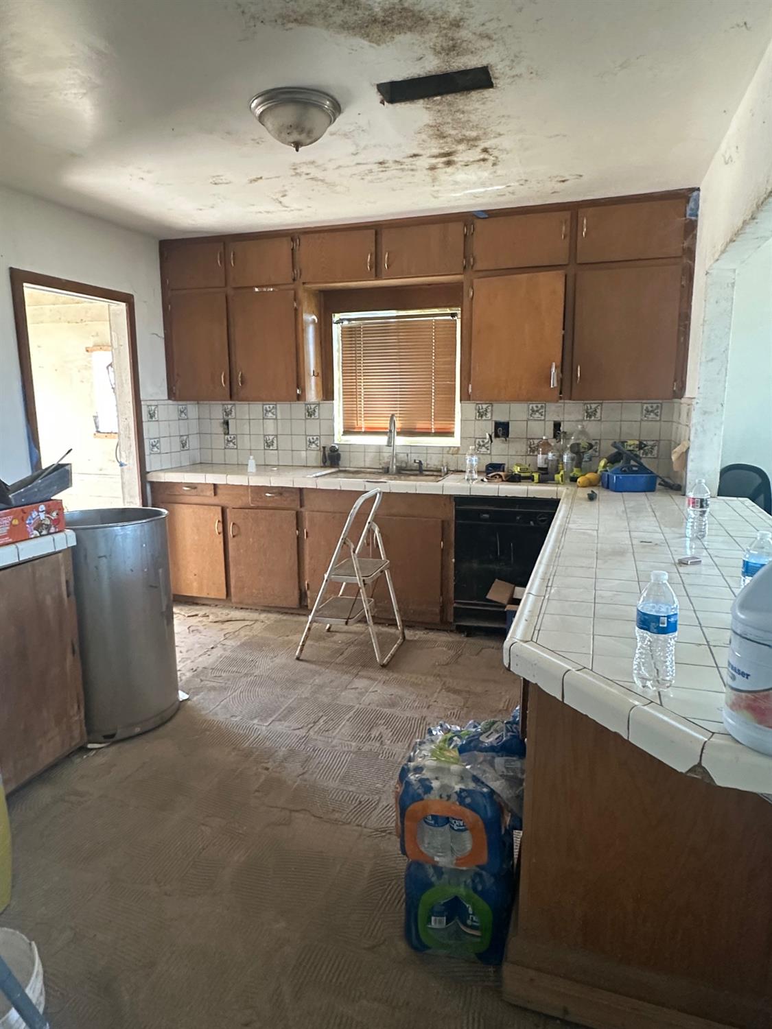 7599 Ave 152 Tipton, CA 93272 - Photo 5 of 17 a kitchen with sink cabinets and window