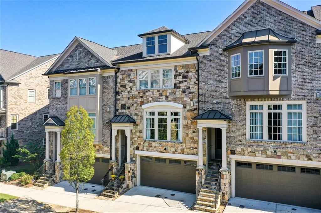 2073 Bellrick Road Northwest Atlanta, GA 30318 - Photo 1 of 1 a front view of a house with street