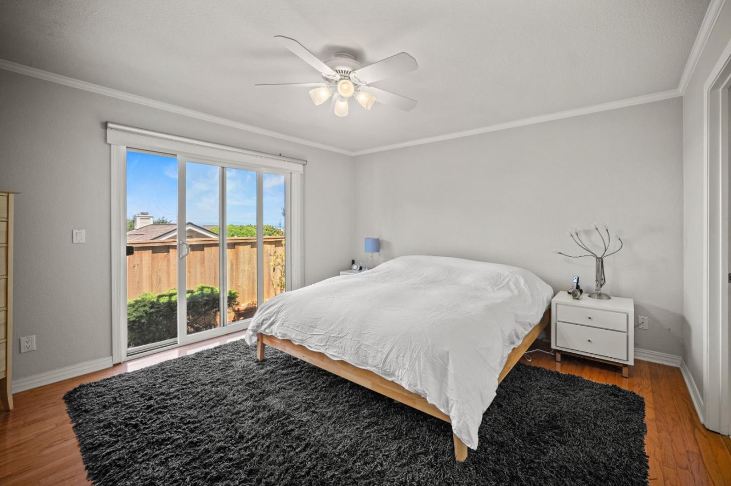 1051 Highlander Drive Seaside, CA 93955 - Photo 32 of 40 a bed sitting in a spacious bedroom next to a window