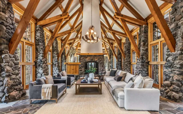 a view of a patio with couches and a fire pit