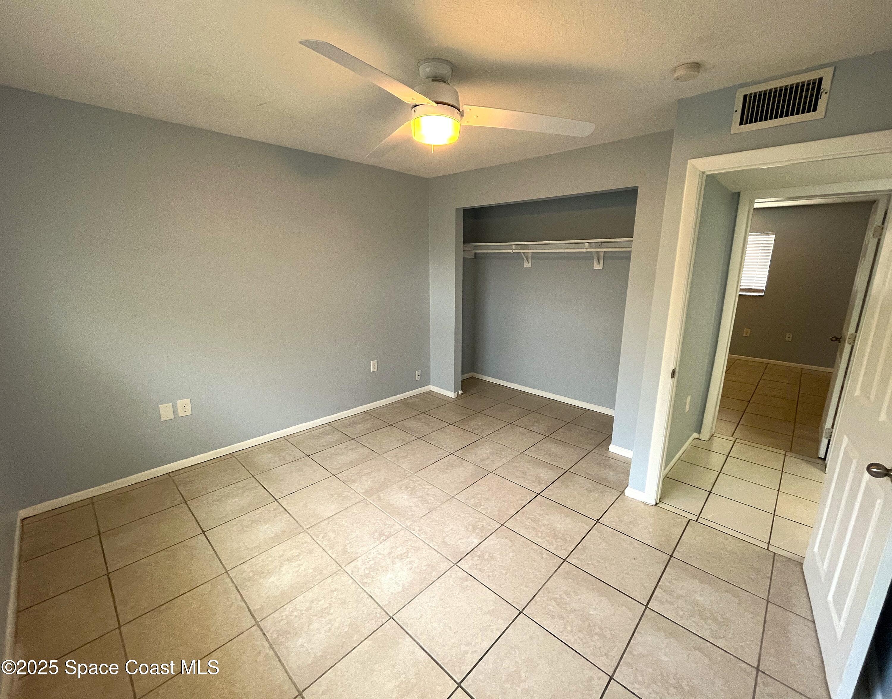 331 South Brevard Avenue, Unit B Cocoa Beach, FL 32931 - Photo 18 of 23 a view of a hallway