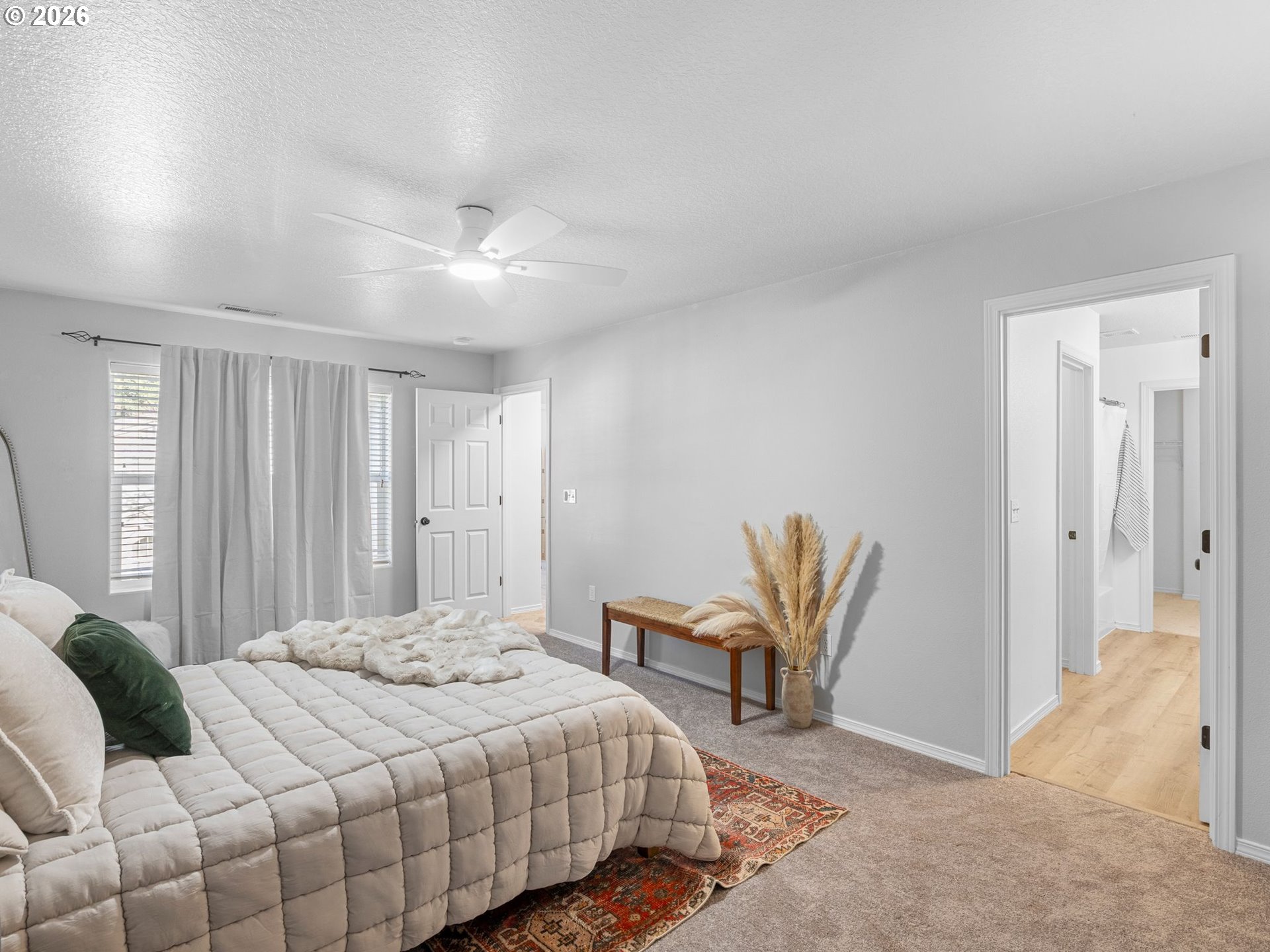 6225 Southwest 182nd Terrace Beaverton, OR 97007 - Photo 20 of 36 a bedroom with a bed and chair