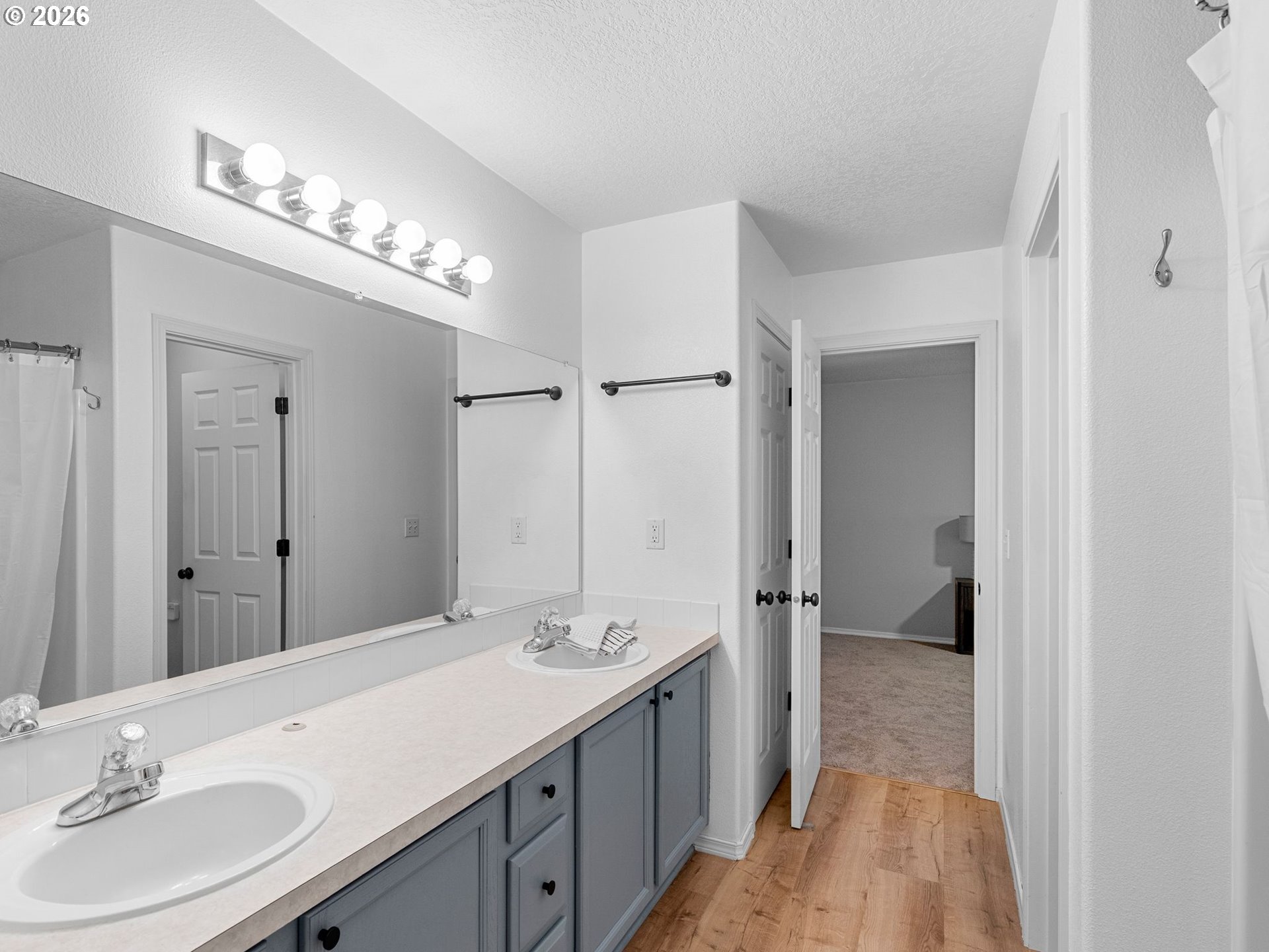 6225 Southwest 182nd Terrace Beaverton, OR 97007 - Photo 22 of 36 a spacious bathroom with a double vanity sink mirror and double