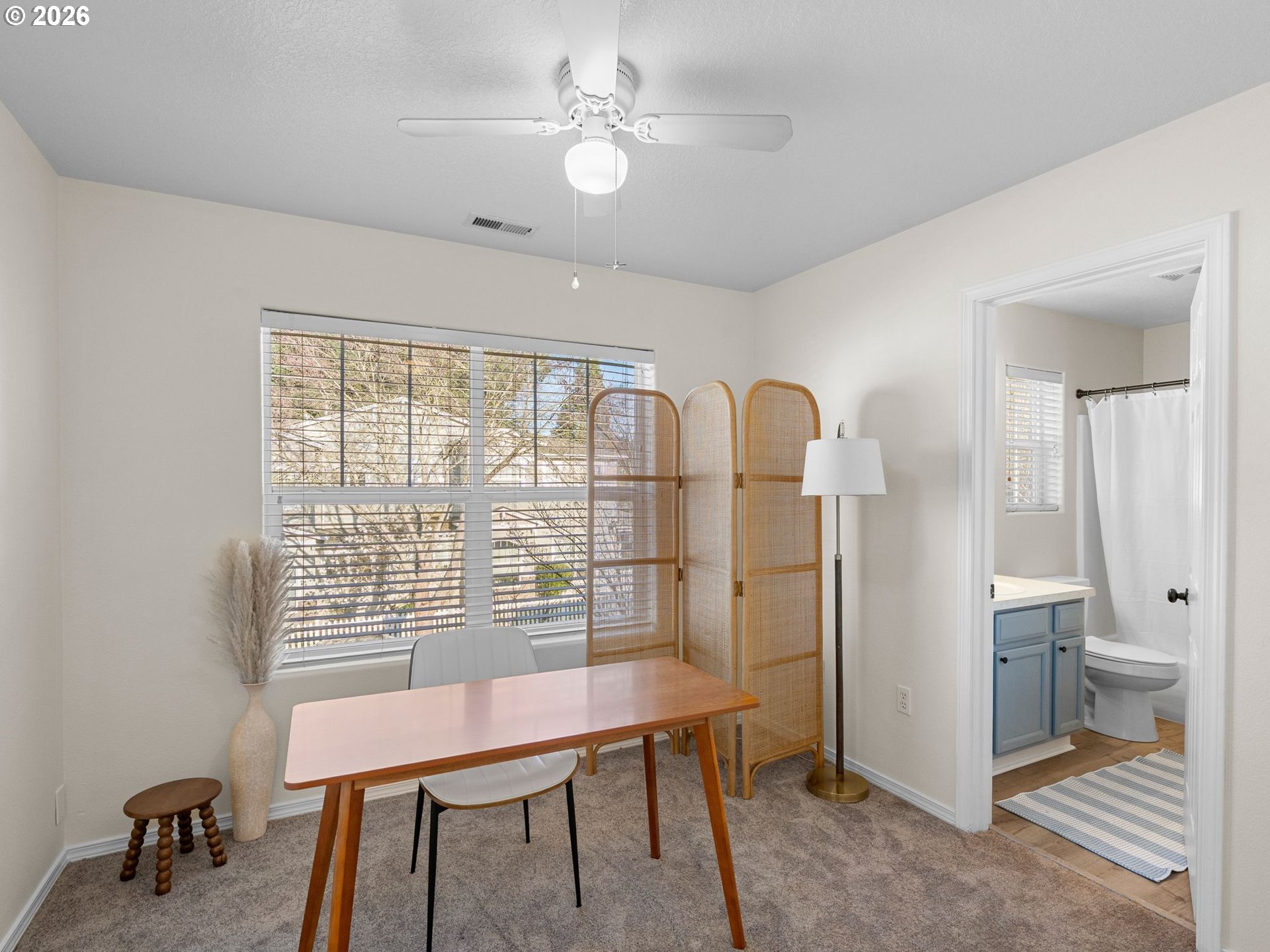 6225 Southwest 182nd Terrace Beaverton, OR 97007 - Photo 24 of 36 a view of a workspace with furniture and a window