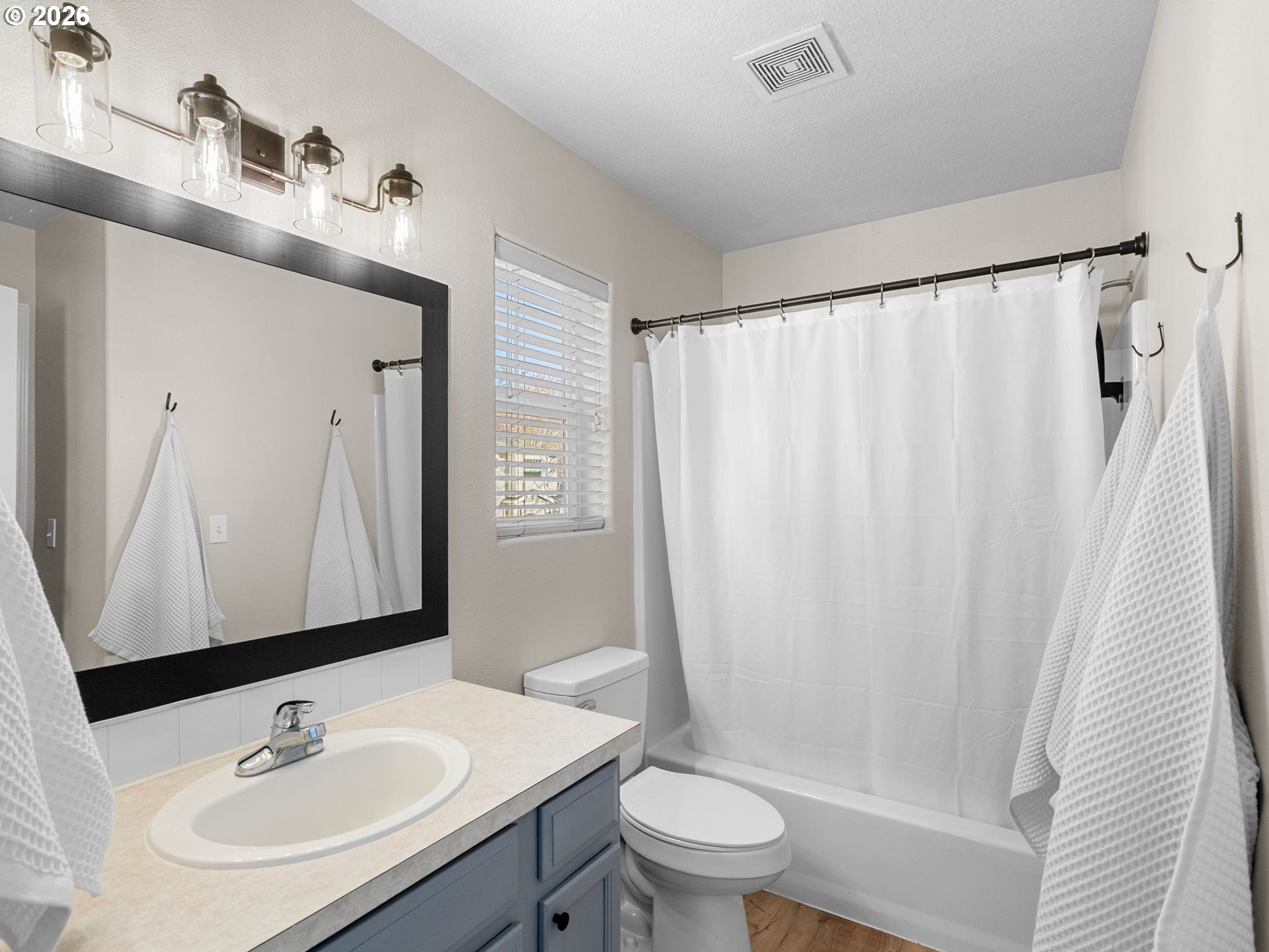 6225 Southwest 182nd Terrace Beaverton, OR 97007 - Photo 27 of 36 a bathroom with a sink toilet and shower