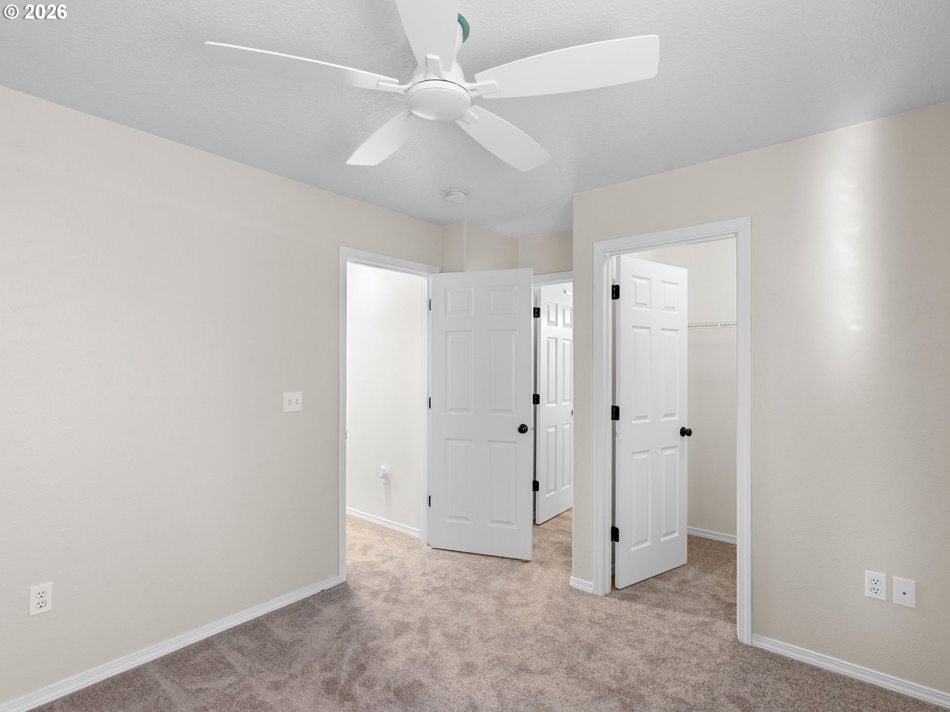 6225 Southwest 182nd Terrace Beaverton, OR 97007 - Photo 30 of 36 an empty room with fan and a ceiling fan