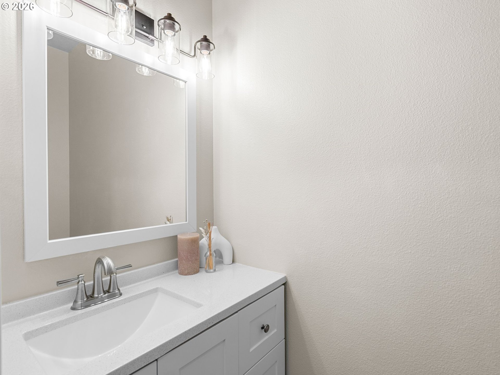6225 Southwest 182nd Terrace Beaverton, OR 97007 - Photo 32 of 36 a bathroom with a sink and a mirror