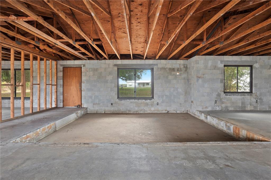 17425 Lake Ingram Road Winter Garden, FL 34787 - Photo 18 of 38 an empty room with windows