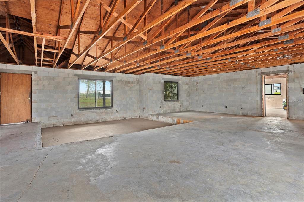 17425 Lake Ingram Road Winter Garden, FL 34787 - Photo 20 of 38 a view of an empty room with windows