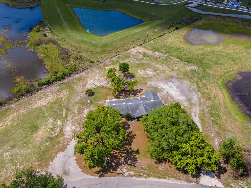 17425 Lake Ingram Road Winter Garden, FL 34787 - Photo 37 of 38 a view of a lake with a yard