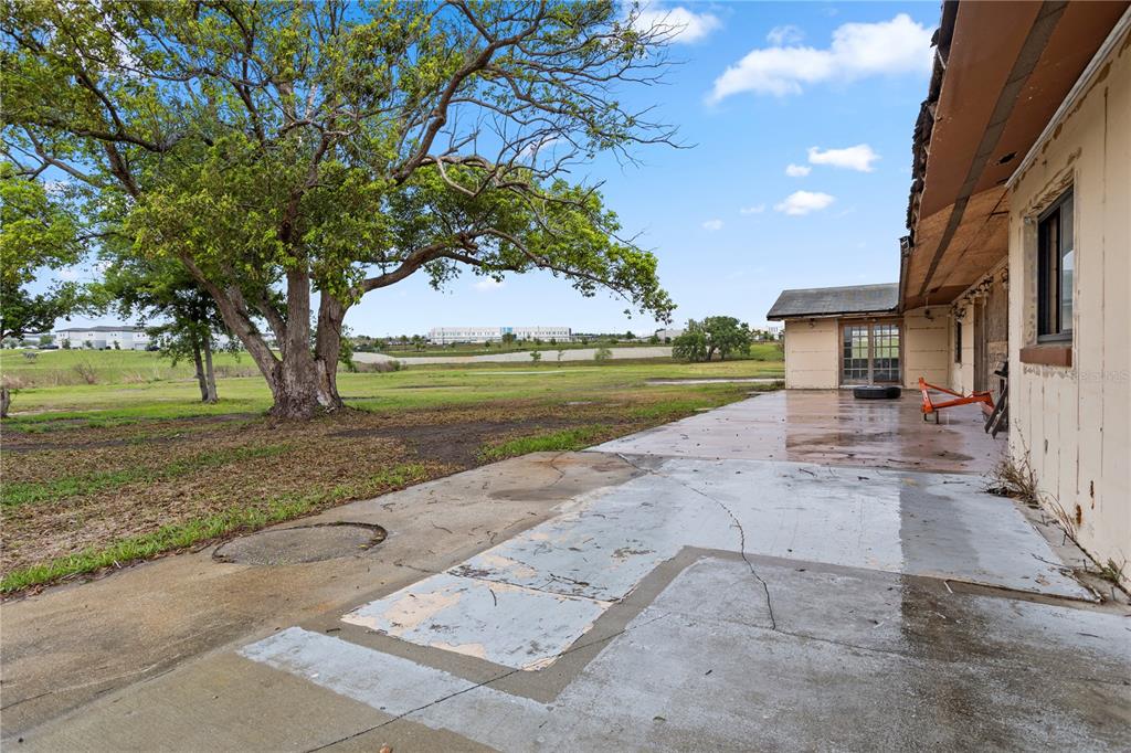 17425 Lake Ingram Road Winter Garden, FL 34787 - Photo 8 of 38 a view of a house with a yard