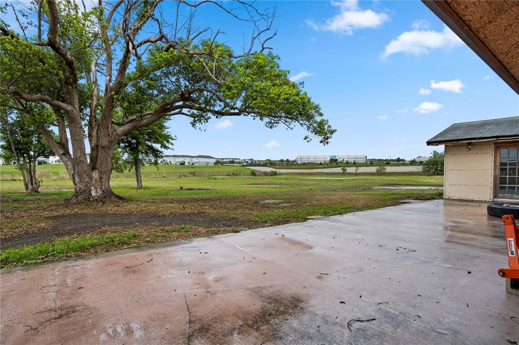 17425 Lake Ingram Road Winter Garden, FL 34787 - Photo 10 of 38 a view of a lake with a big yard