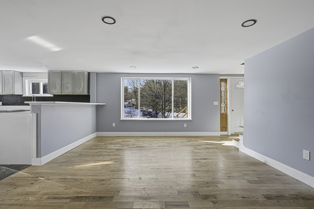 140 Spring Street Athol, MA 01331 - Photo 12 of 42 a view of an empty room with a window