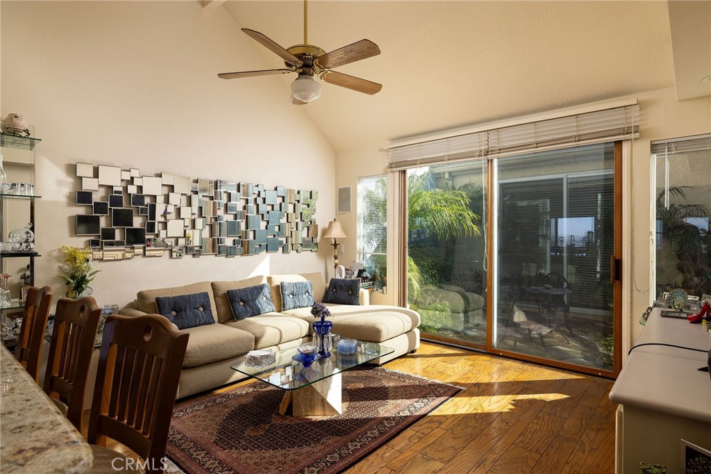 39 Harbor Ridge Drive Newport Beach, CA 92660 - Photo 20 of 53 a living room with furniture and a floor to ceiling window