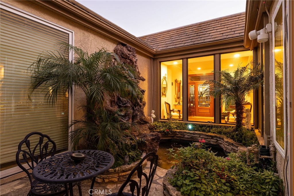 39 Harbor Ridge Drive Newport Beach, CA 92660 - Photo 21 of 53 a backyard of a house with table and chairs