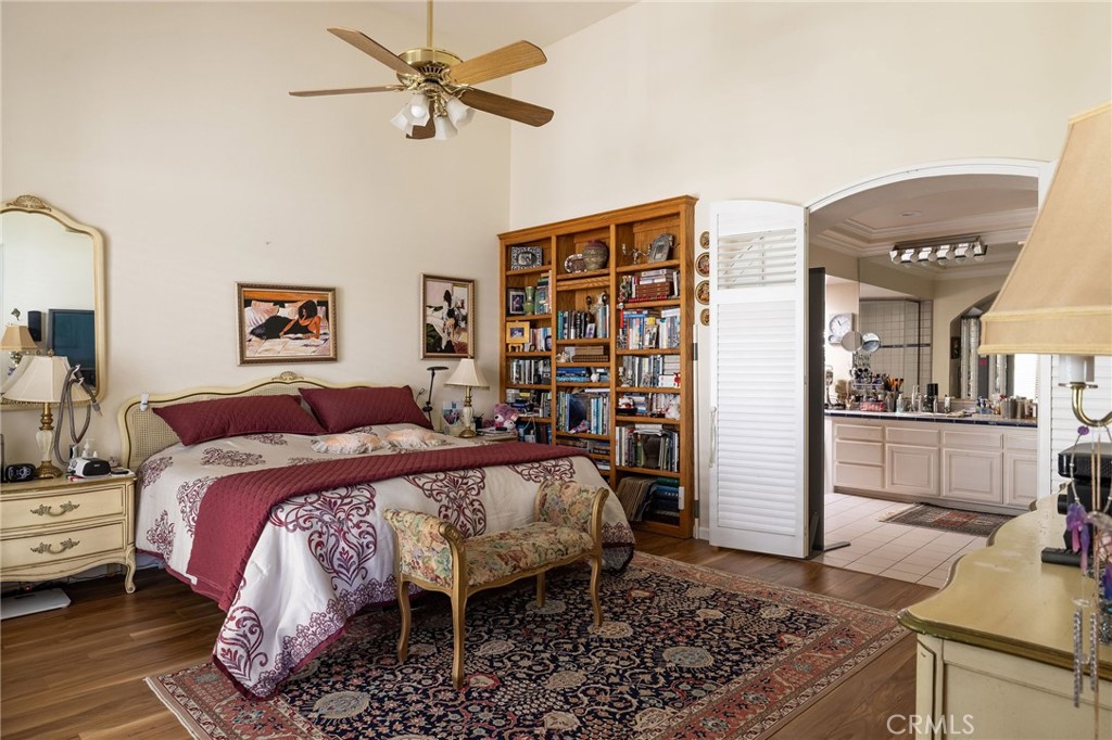 39 Harbor Ridge Drive Newport Beach, CA 92660 - Photo 24 of 53 a bed room with a bed and a chandelier