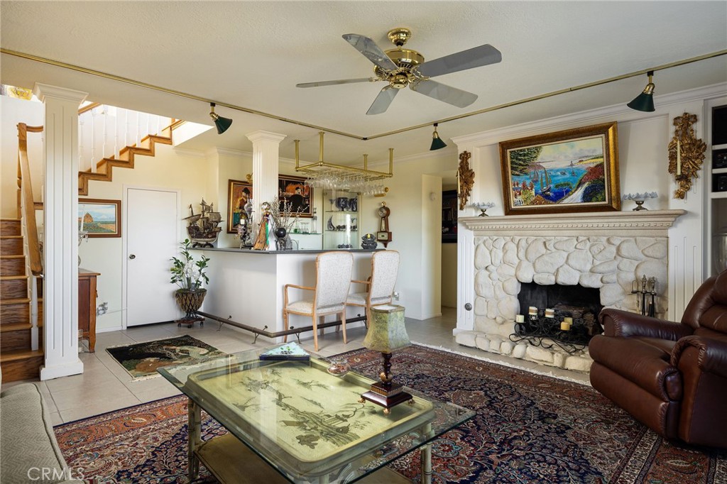 39 Harbor Ridge Drive Newport Beach, CA 92660 - Photo 28 of 53 a living room with furniture and a fireplace