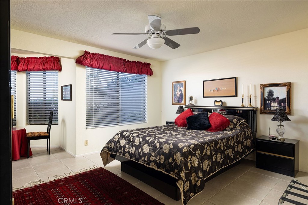 39 Harbor Ridge Drive Newport Beach, CA 92660 - Photo 29 of 53 a bedroom with a bed and wooden floor
