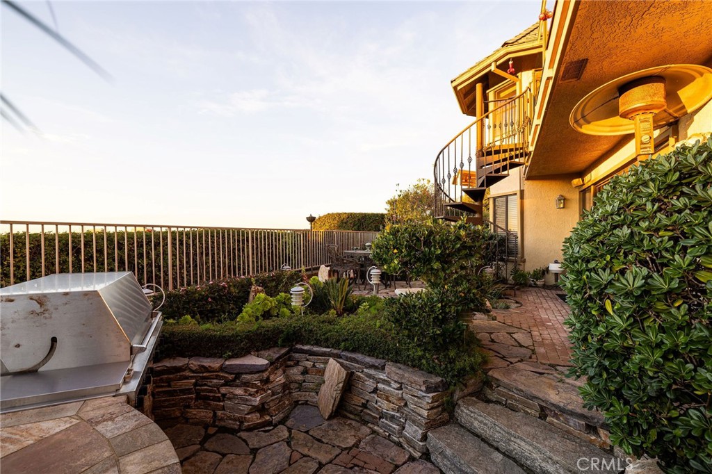 39 Harbor Ridge Drive Newport Beach, CA 92660 - Photo 36 of 53 a view of a chairs and table in the backyard