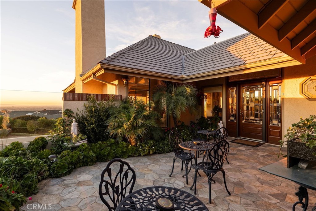 39 Harbor Ridge Drive Newport Beach, CA 92660 - Photo 42 of 53 an outdoor space with furniture and umbrella