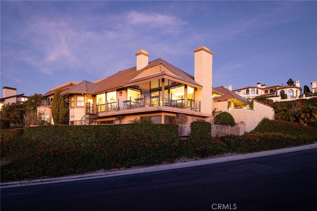 39 Harbor Ridge Drive Newport Beach, CA 92660 - Photo 53 of 53 a front view of a house with a yard