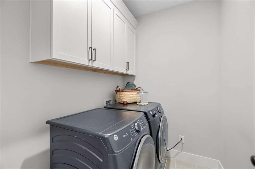 4466 Lemon Street Acworth, GA 30101 - Photo 39 of 65 a utility room with dryer and washer
