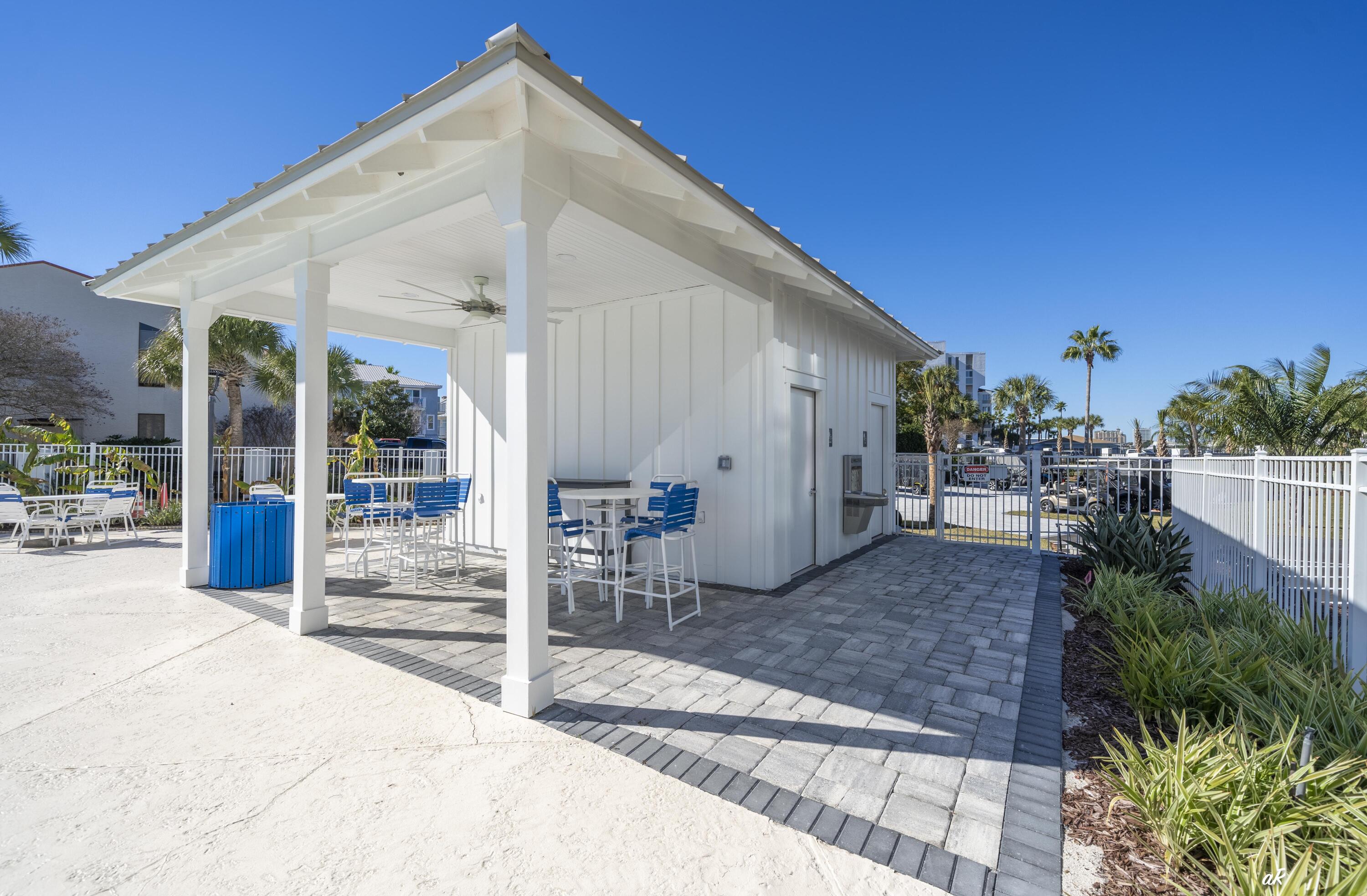 30 Moreno Point Road, Unit 404A Destin, FL 32541 - Photo 43 of 52 a view of a house with a patio
