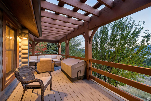 12465 Bone Road Kamas, UT 84036 - Photo 54 of 63 Expansive outdoor deck featuring a wood pergola and durable wood-finish flooring