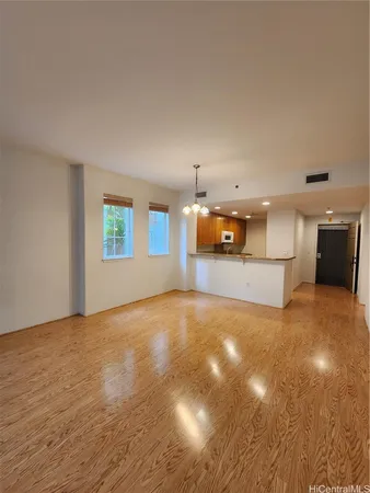 a view of a kitchen with a dishwasher and a cabinets