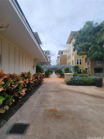 a view of a street with cars