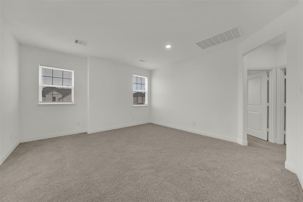 2901 Isla Terrace Princeton, TX 75407 - Photo 22 of 33 a view of an empty room with a window