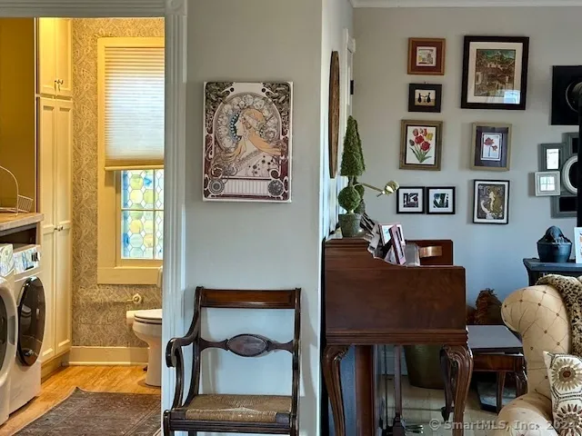 a living room with furniture and a window