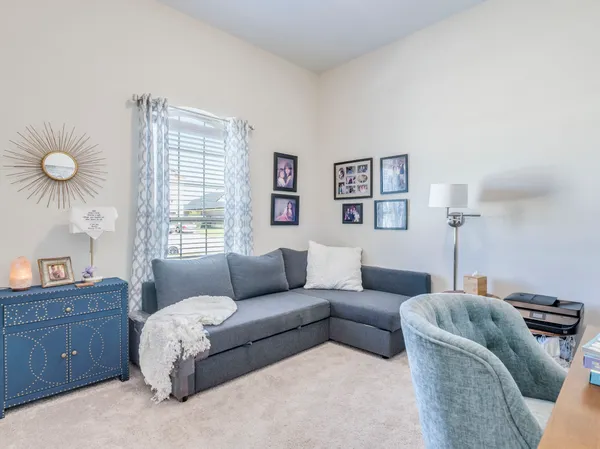 a living room with furniture