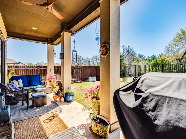 a view of swimming pool with outdoor seating and furniture