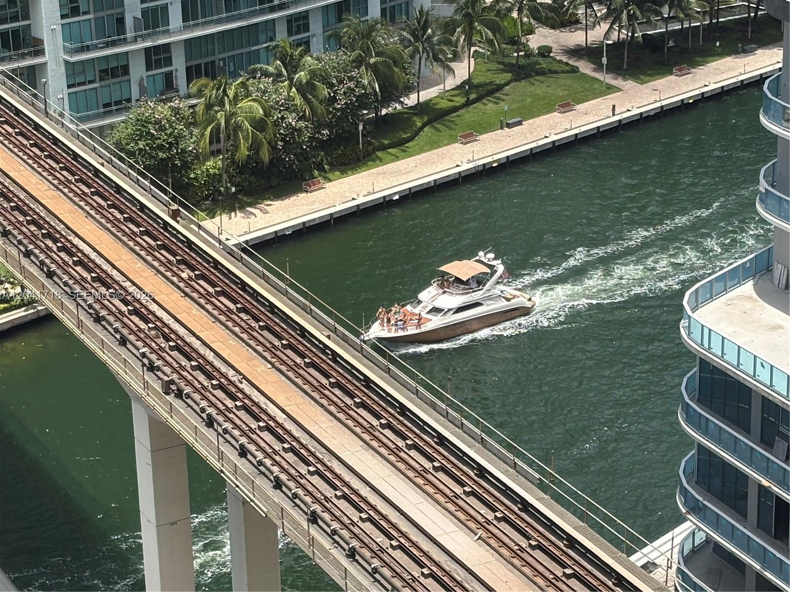 690 Southwest 1st Court, Unit 2124 Miami, FL 33130 - Photo 20 of 20 a view of a balcony with a lake view