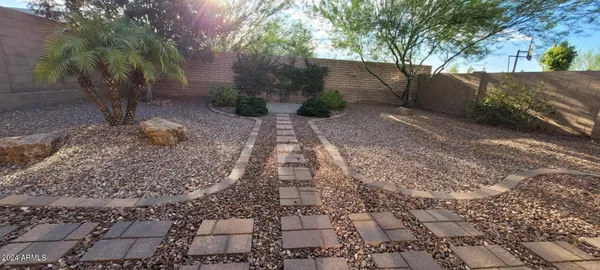 a view of backyard with green space