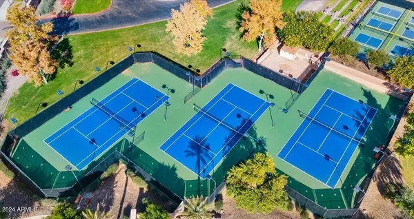 an aerial view of a house with a swimming pool