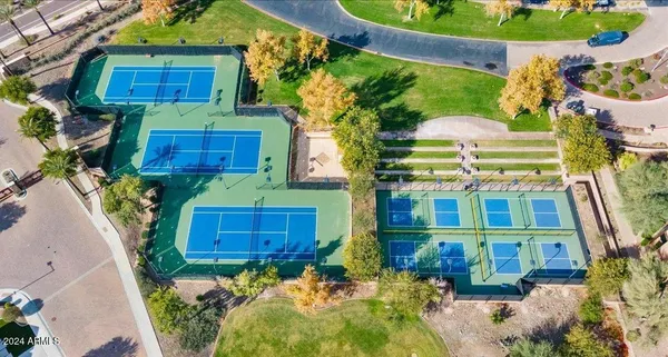 a aerial view of a house with a yard and garden