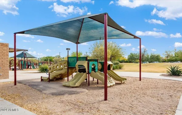 a view of a park with slide