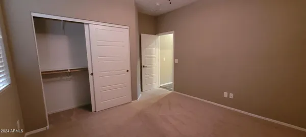 an empty room with closet