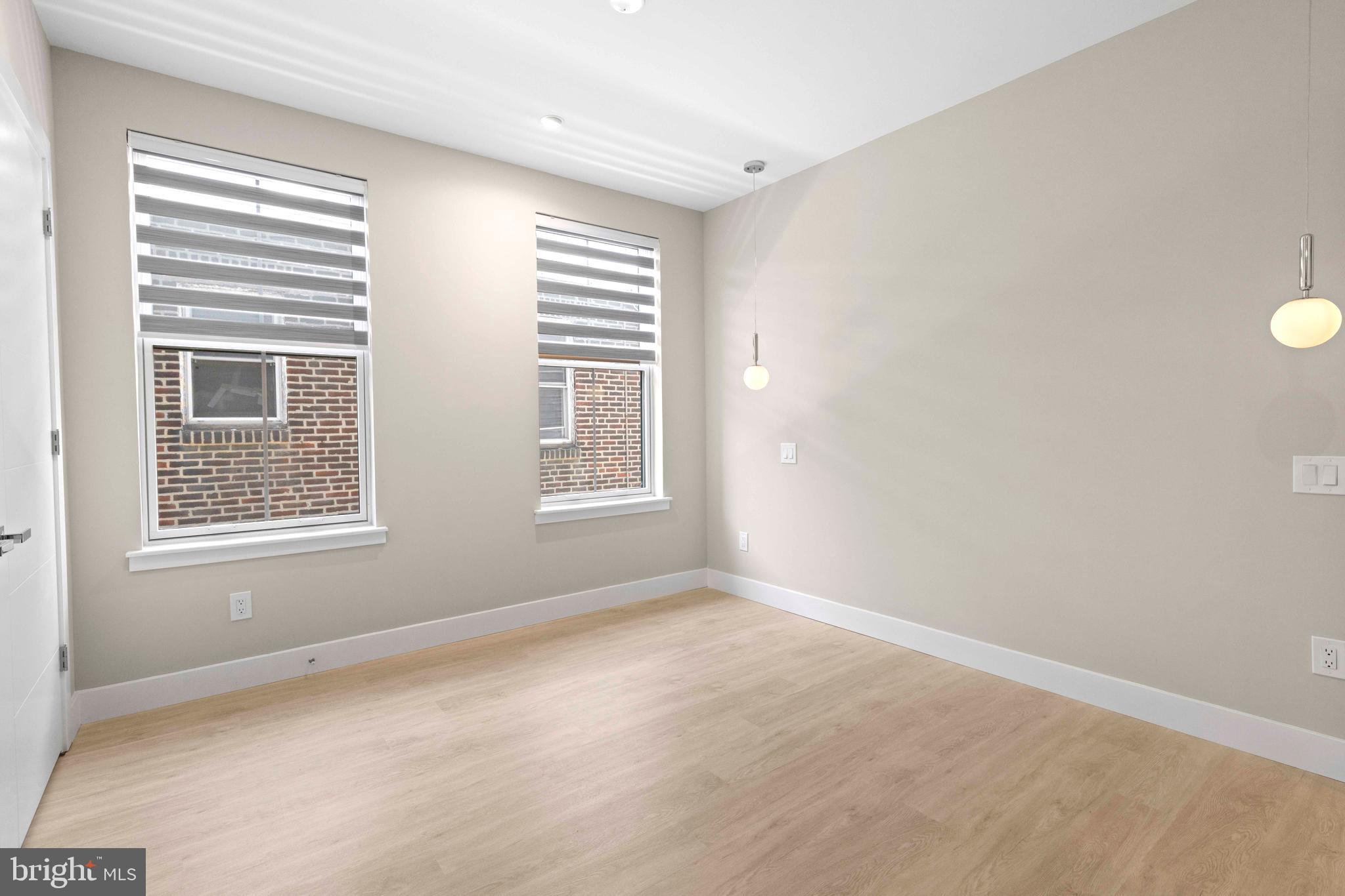 4720 Richmond Street, Unit 1 Philadelphia, PA 19137 - Photo 12 of 14 an empty room with a window