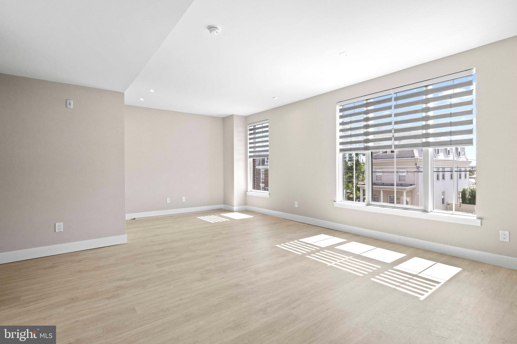 4720 Richmond Street, Unit 1 Philadelphia, PA 19137 - Photo 4 of 14 a view of an empty room with a window