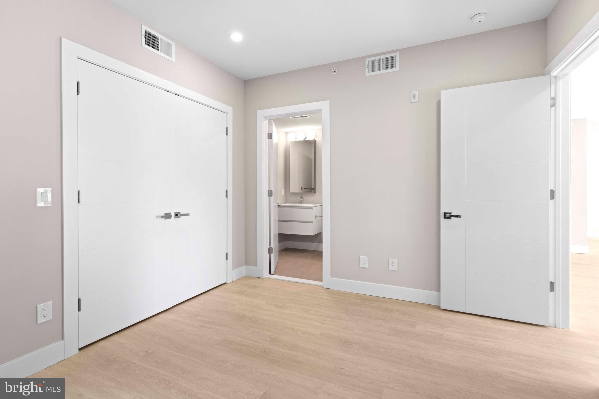 4720 Richmond Street, Unit 1 Philadelphia, PA 19137 - Photo 9 of 14 a view of an empty room with closet and a window